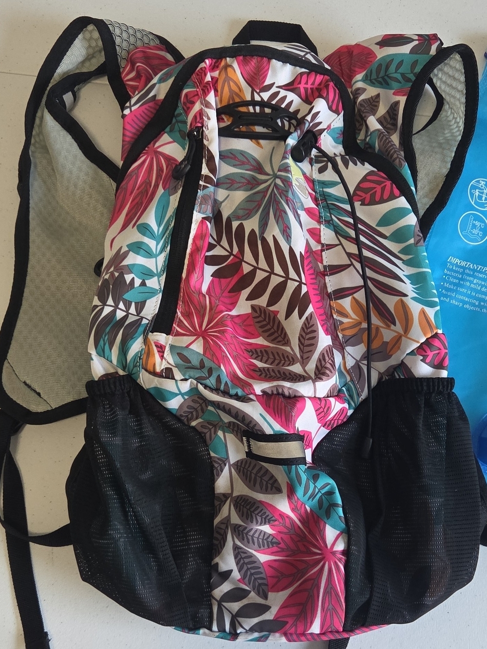 2L Hydration Backpack with Pink Teal Floral Print Pockets Adjustable Comfortable